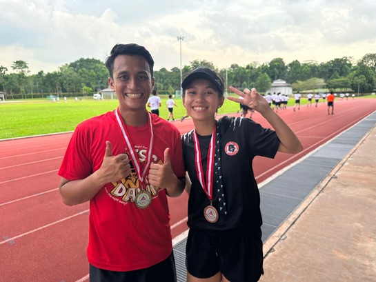 Sergeant (SGT3) Hatadi Faiz (left) and Lieutenant (LTA) Chia Jingyi (right) at the inaugural SCDF Inter-unit Frisbee Tournament in February 2023