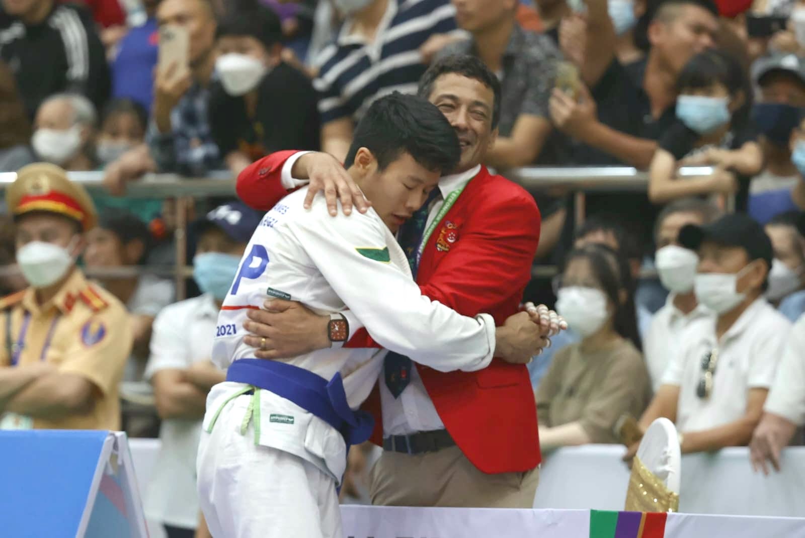 CPL (NSF) Noah and his coach after a victorious fight