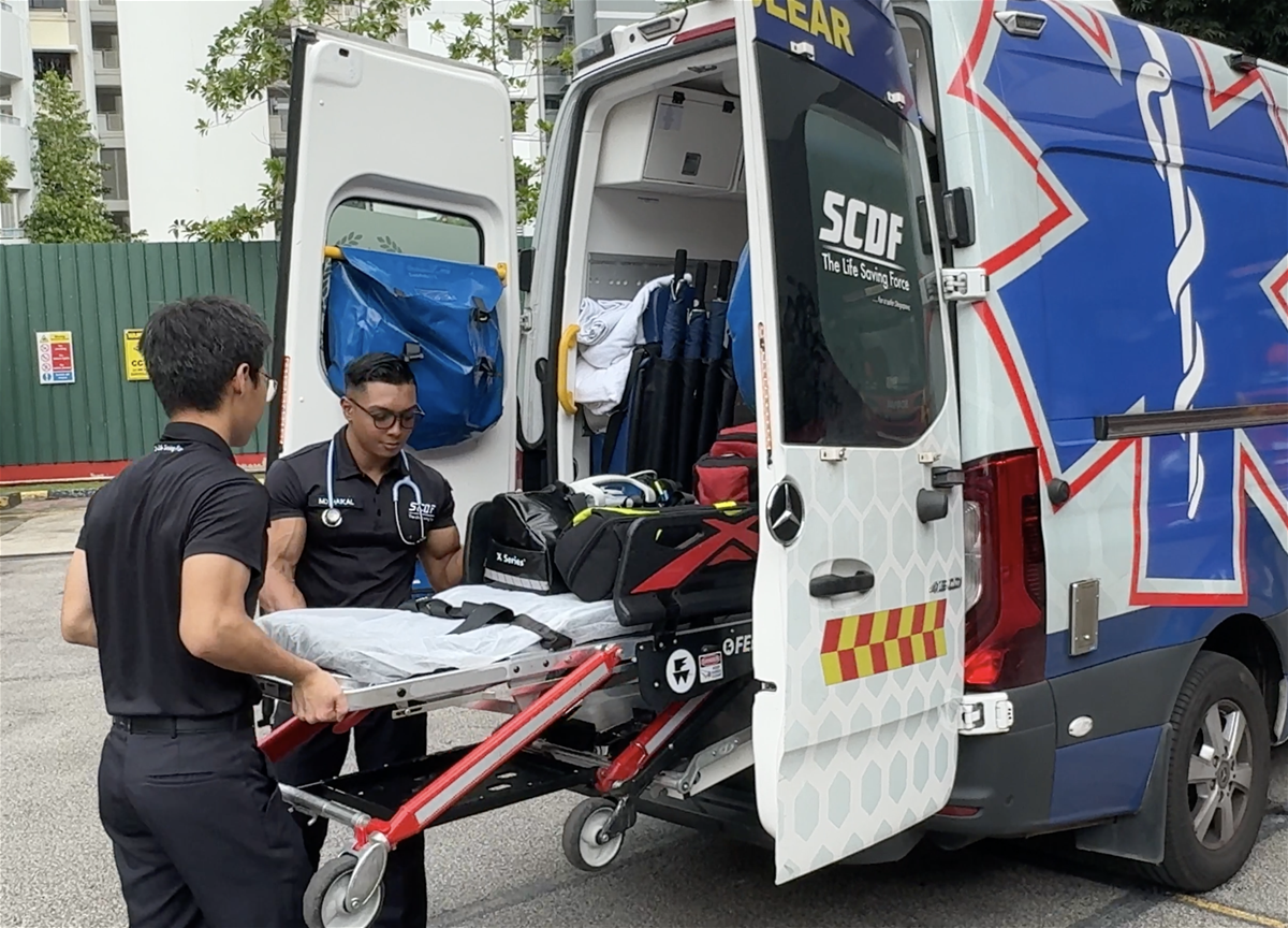 SGT2 Mohamad Haikal responding to an incident with his colleagues.