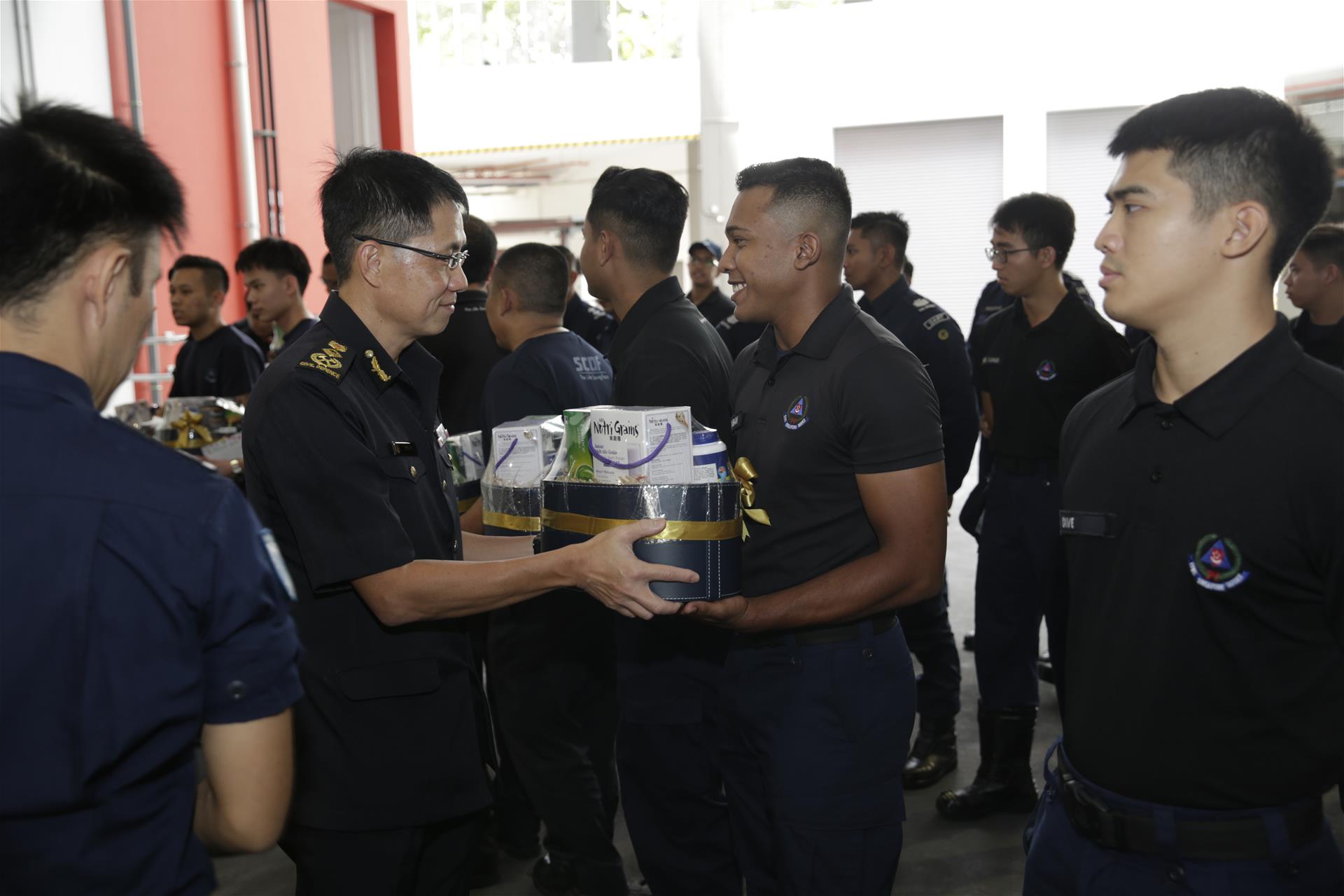 Commissioner Eric Yap showing appreciation to SCDF personnel at Kallang Fire Station Commissioner Eric Yap showing appreciation to SCDF personnel at Kallang Fire Station
