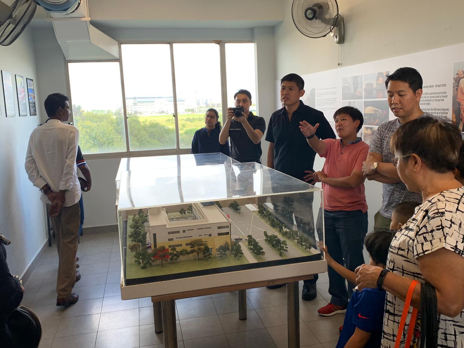 MAJ Clara Toh briefing the guests at the mini-gallery. MAJ Clara Toh briefing the guests at the mini-gallery.