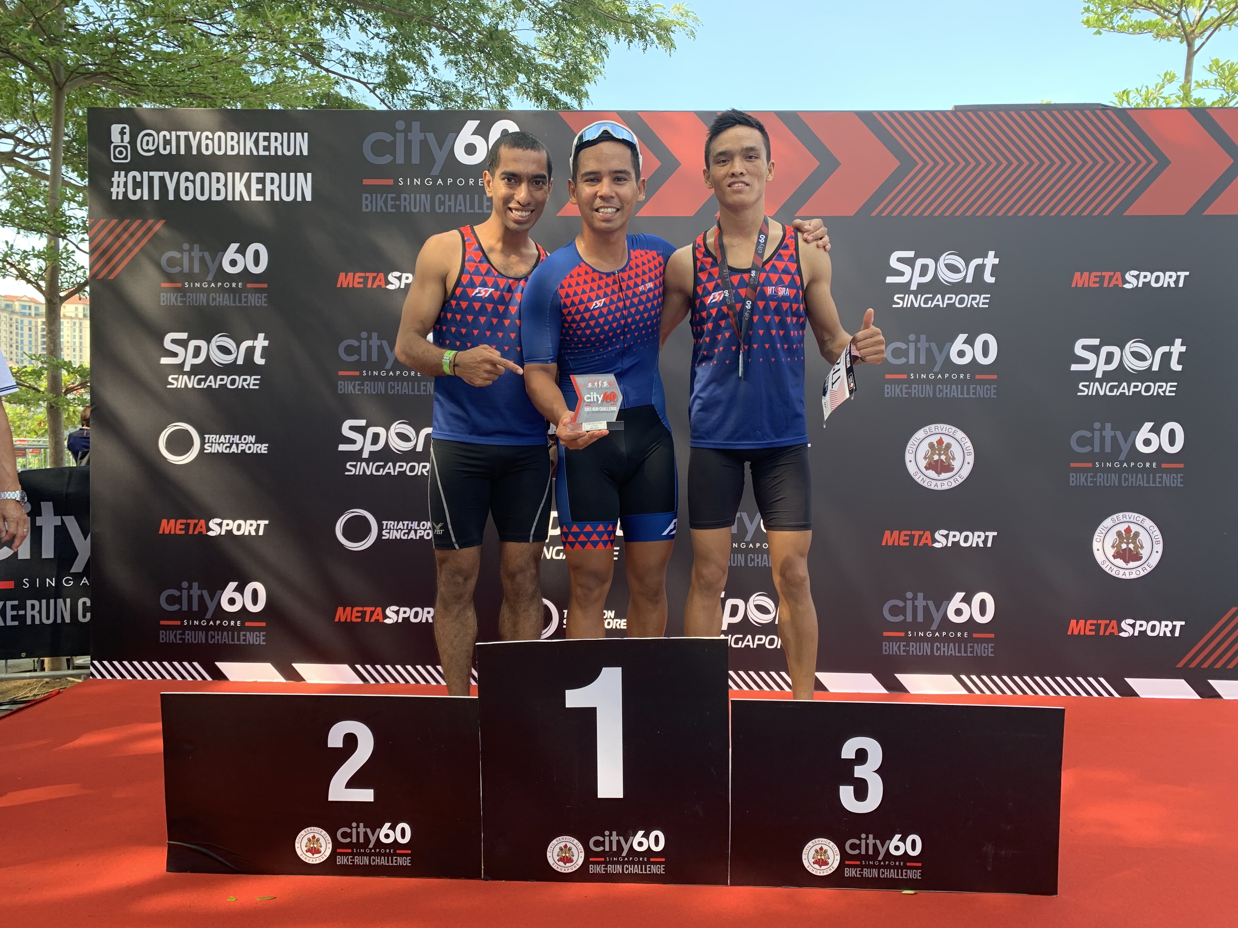 The Home Team champions at the City 60 Bike-Run Challenge (SSG Ahmad Ridhwan Bin Dahlan of SCDF in the middle.