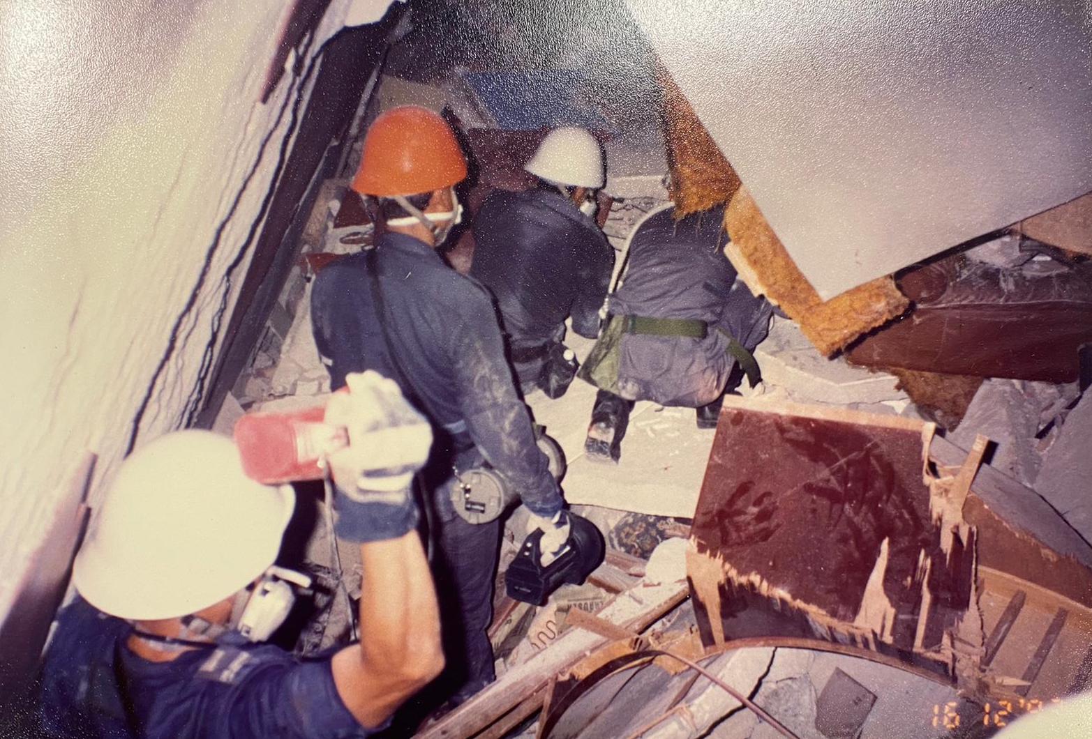 DART rescuers working round-the-clock searching thoroughly through the rubble for signs of life