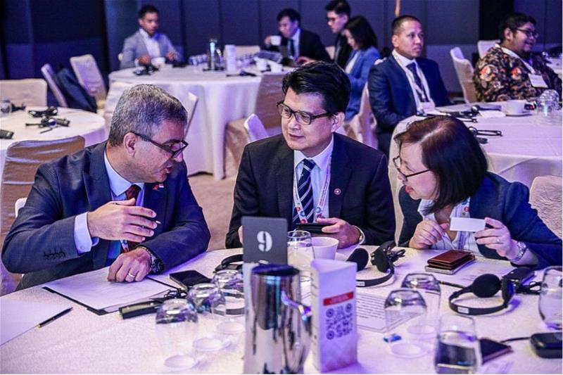 Invited guests engaged in discussion2