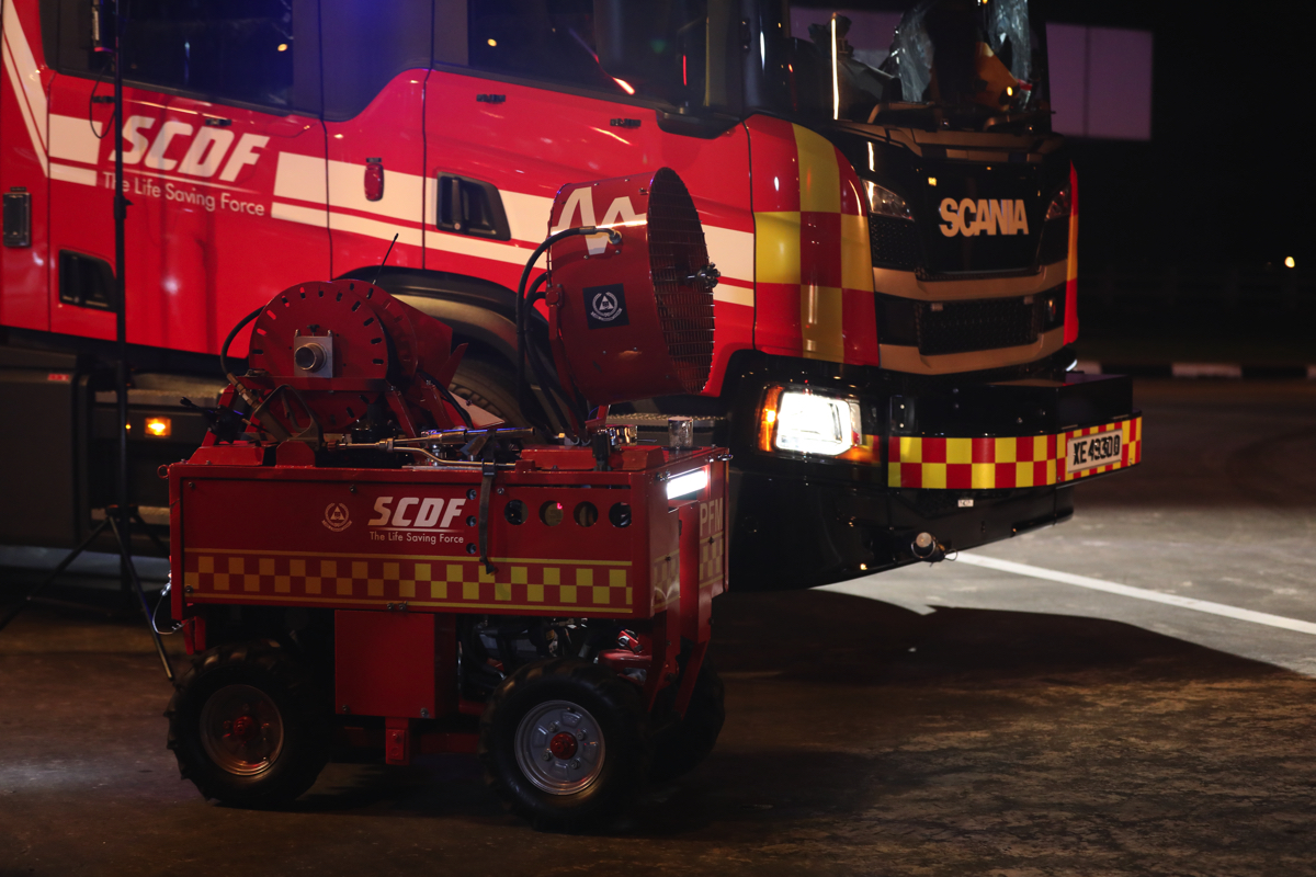 The Pumper Firefighting Machine (foreground)
