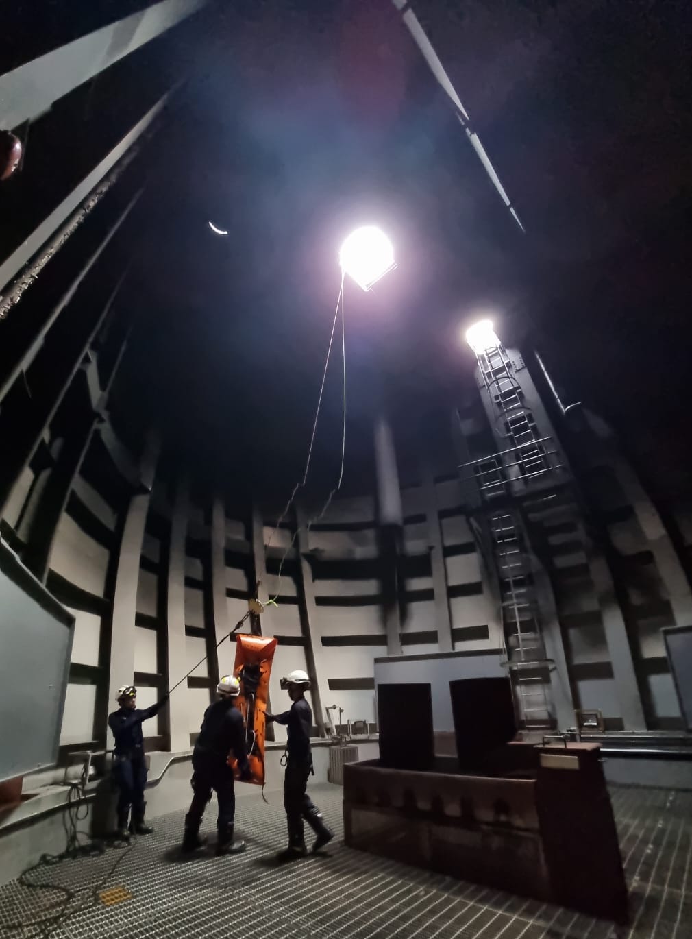 Trainees carrying out a simulated height rescue exercise inside the ORCA